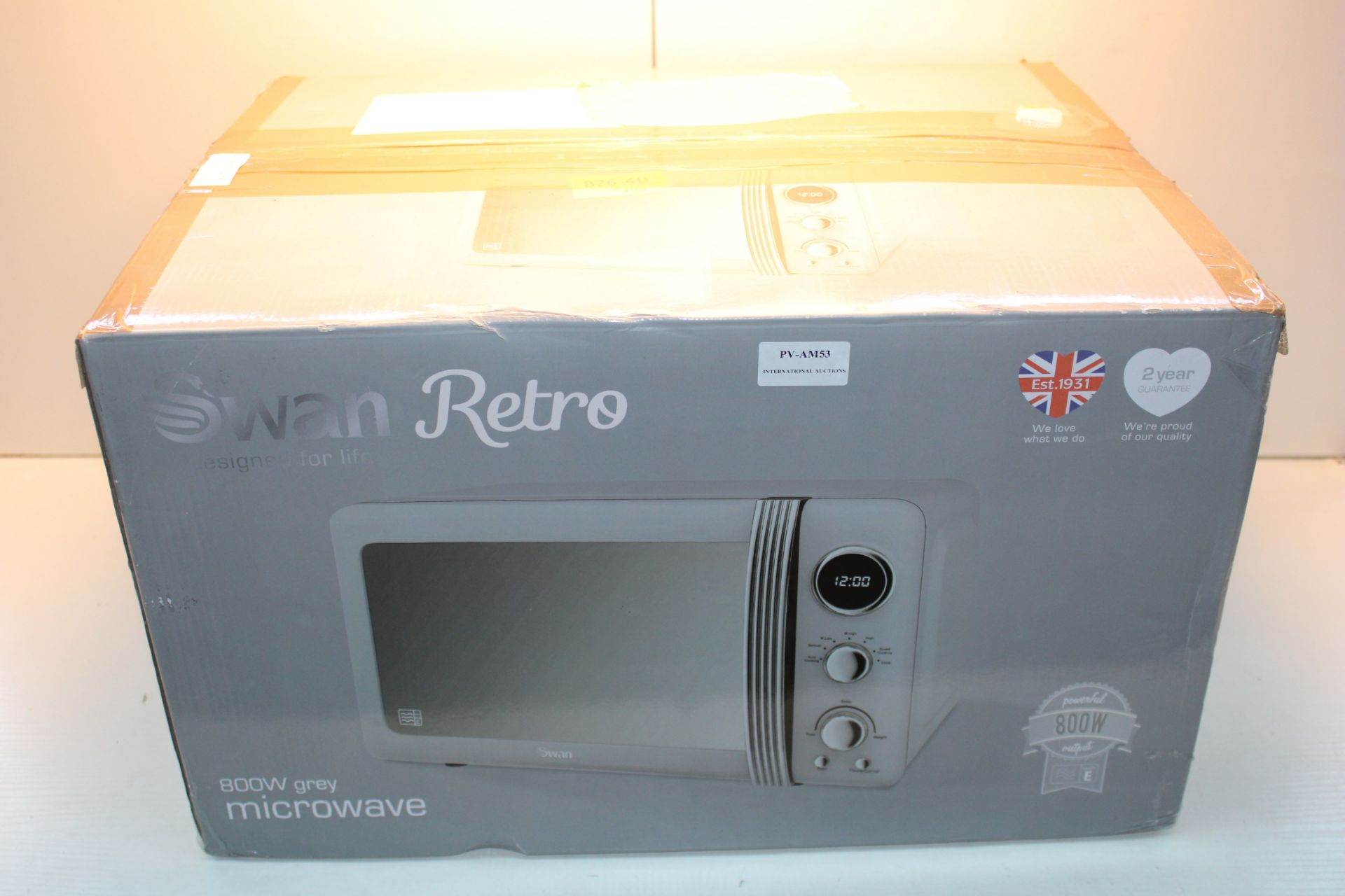 BOXED SWAN RETRO MICROWAVE OVEN Condition ReportAppraisal Available on Request- All Items are