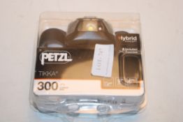 BOXED PETZL HYBRID TIKKA 300 LUMENS HEAD LAMP RRP £26.56Condition ReportAppraisal Available on