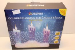 BOXED CHRISTMAS WORKSHOP COLOUR CHANGING LED CANDLE BRIDGE WITH GLITTERCondition ReportAppraisal