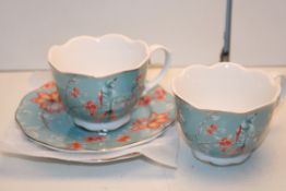 BOXED JOE BROWNS TEA CUP AND SAUCER SET OF 2 Condition ReportAppraisal Available on Request- All