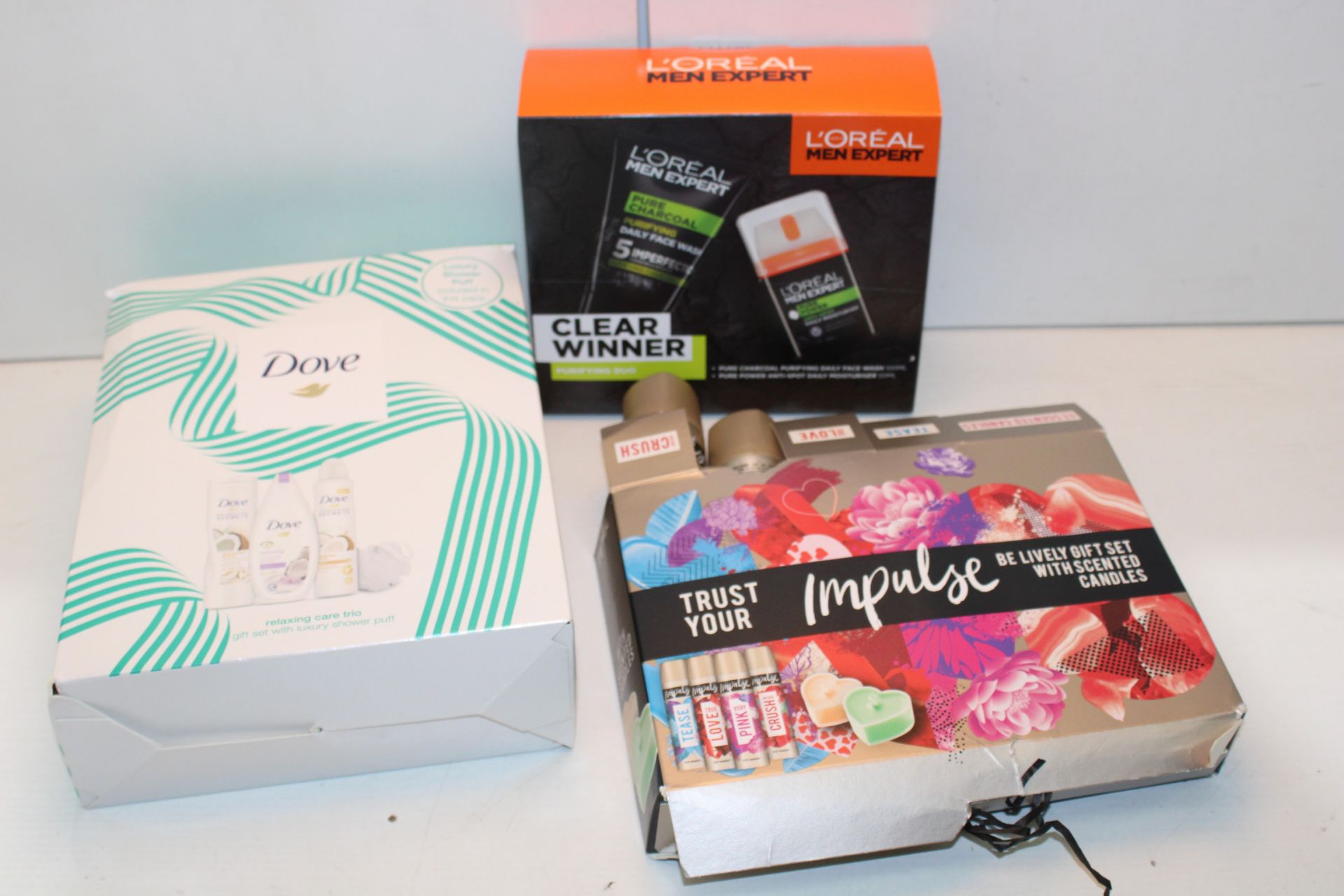 3X BOXED ASSORTED GIFT SETS BY IMPULSE, L'OREAL & DOVE Condition ReportAppraisal Available on