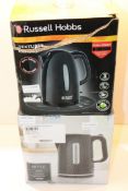 2X BOXED ASSORTED KETTLES BY TESCO & RUSSELL HOBBS Condition Report Appraisal Available on