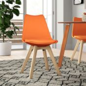 BOXED DRAUGHN UPHOLSTERED DINING CHAIR IN ORANGECondition ReportAppraisal Available on Request-