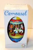 BOXED WOODEN TOY CAROUSEL Condition Report Appraisal Available on Request- All Items are Unchecked/