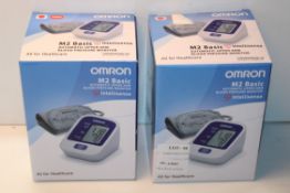 2X BOXED OMRON M2 BASIC AUTOMATIC UPPER ARM BLOOD PRESSURE MONITOR INTELLISENSE COMBINED RRP £72.