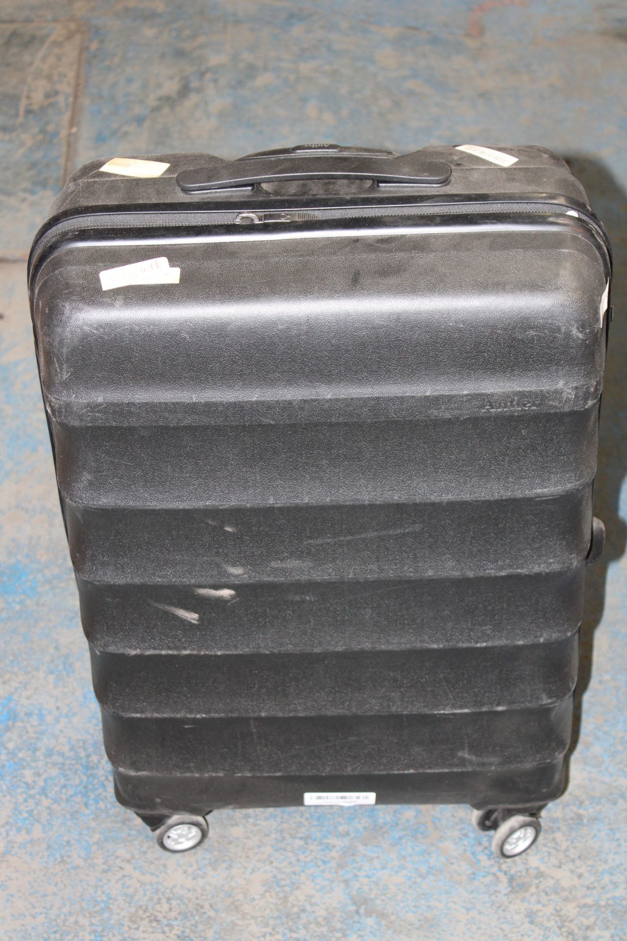 UNBOXED HARD SHELLED WHEELED SUITCASE Condition Report Appraisal Available on Request- All Items are