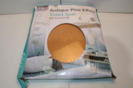 BOXED ANIKA ANTIQUE PINE EFFECT TOILET SEAT Condition ReportAppraisal Available on Request- All