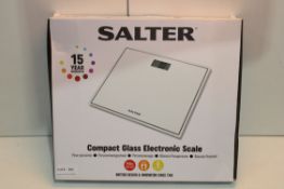 BOXED SALTER COMPACT GLASS ELECTRONIC SCALE RRP £19.99Condition ReportAppraisal Available on