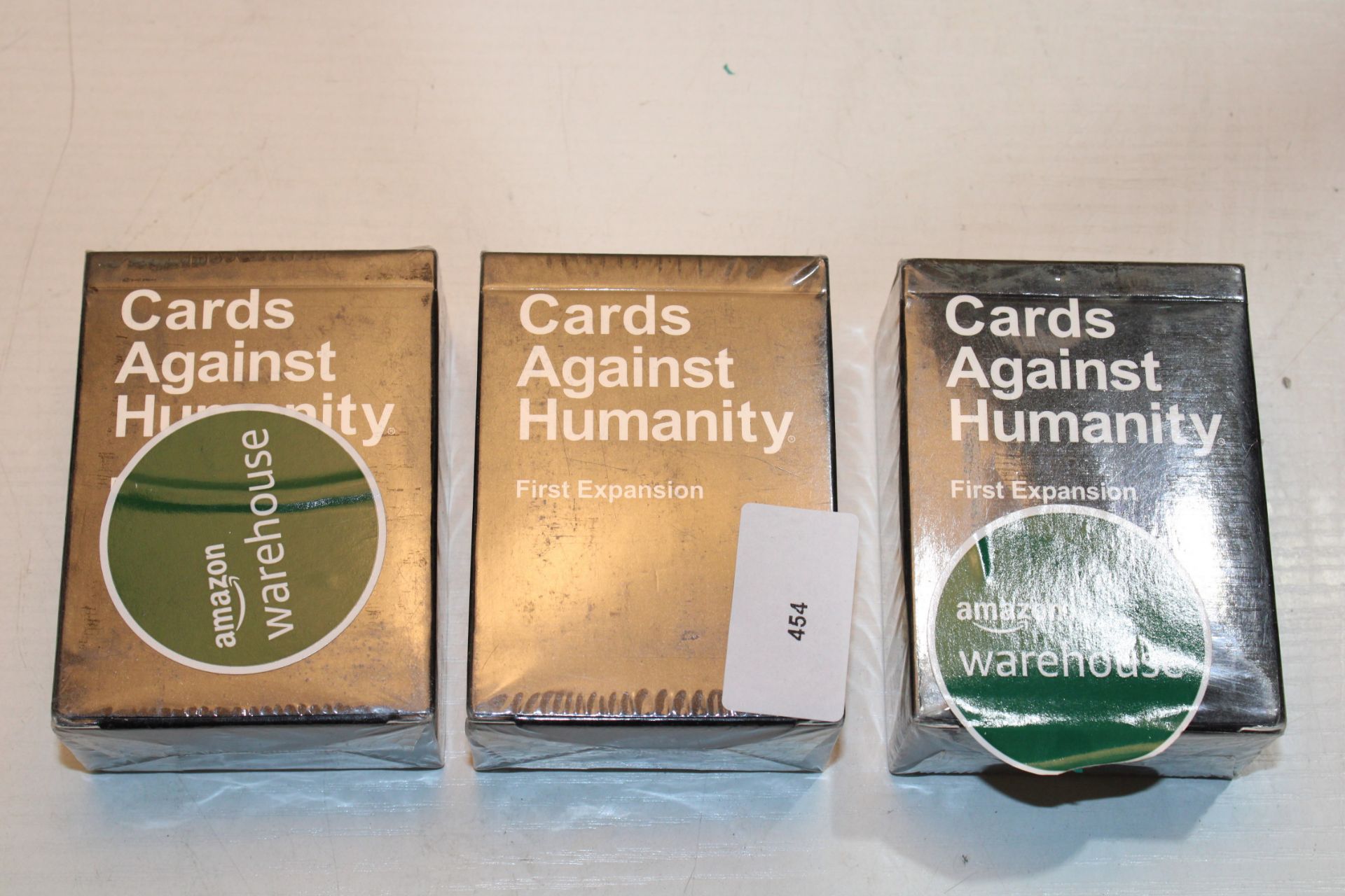 3X PACKS SEALED CARDS AGAINST HUMANITY FIRST EXPANSION PACKS Condition ReportAppraisal Available