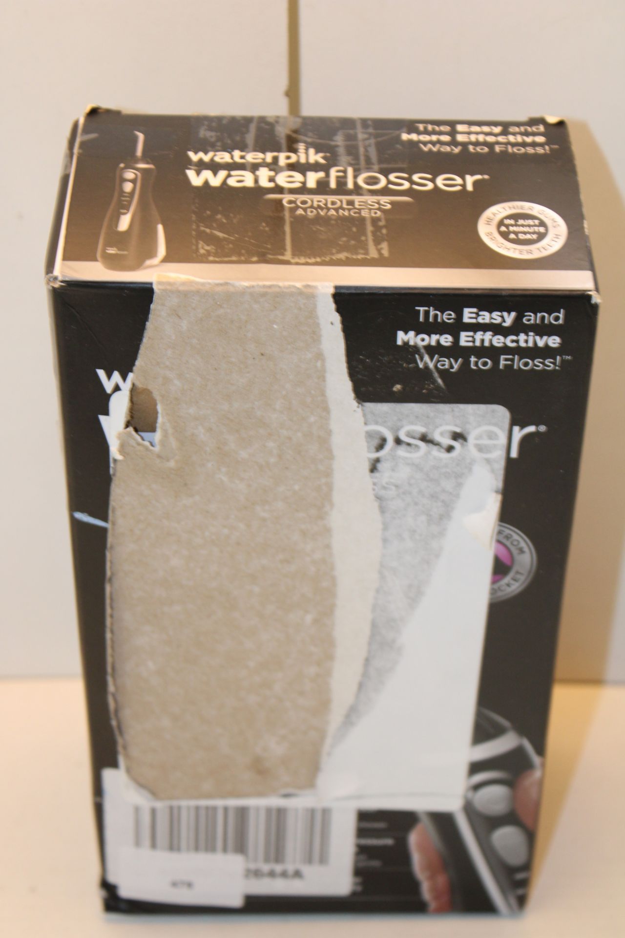 BOXED WATERPIK WATER FLOSSER CORDLESS ADVANCED RRP £79.00Condition ReportAppraisal Available on