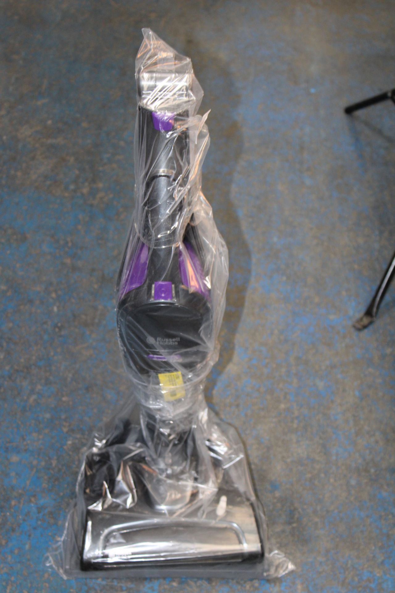 UNBOXED RUSSELL HOBBS CORDLESS HANDHELD/UPRIGHT VACUUM CLEANER RRP £80.00Condition ReportAppraisal