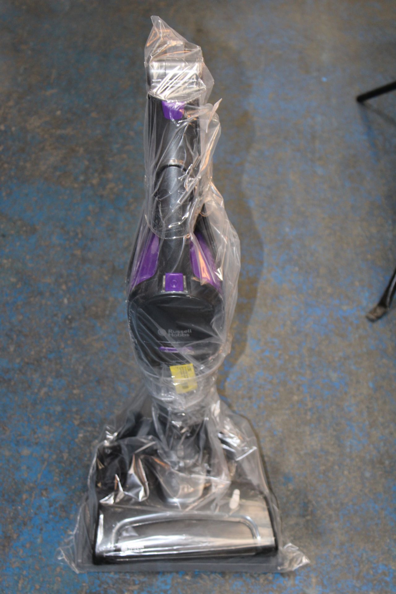 UNBOXED RUSSELL HOBBS CORDLESS HANDHELD/UPRIGHT VACUUM CLEANER RRP £80.00Condition ReportAppraisal