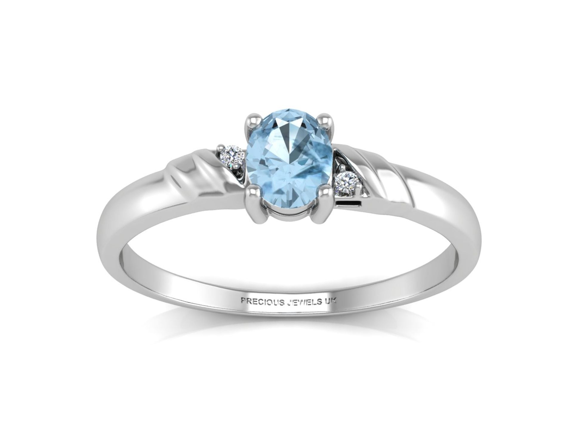 9ct White Gold Diamond And Blue Topaz Ring 0.01 Carats - Valued by GIE £950.00 - An oval Blue - Image 3 of 5
