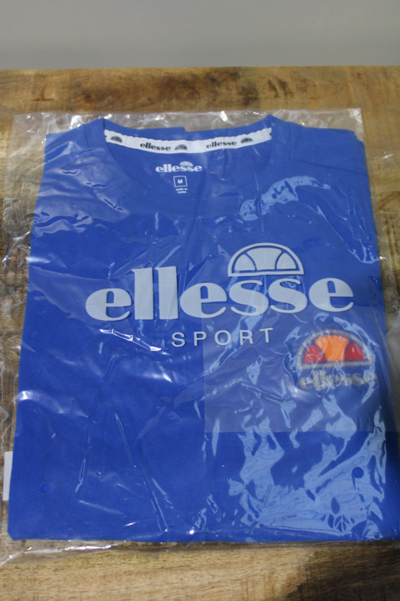 BRAND NEW ELLESSE SPORT BLUE T-SHIRT Condition ReportBRAND NEW