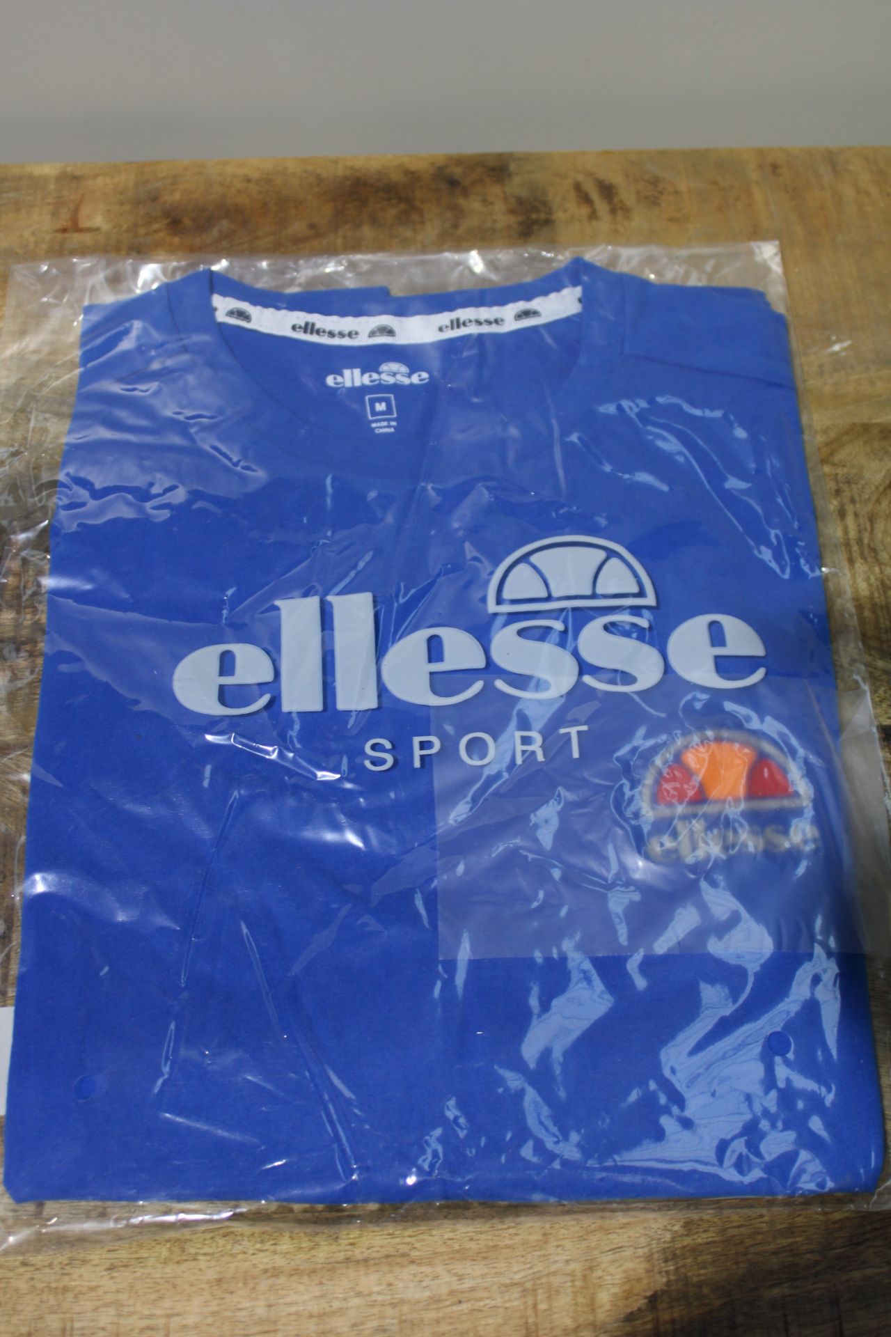 BRAND NEW ELLESSE SPORT BLUE T-SHIRT Condition ReportBRAND NEW