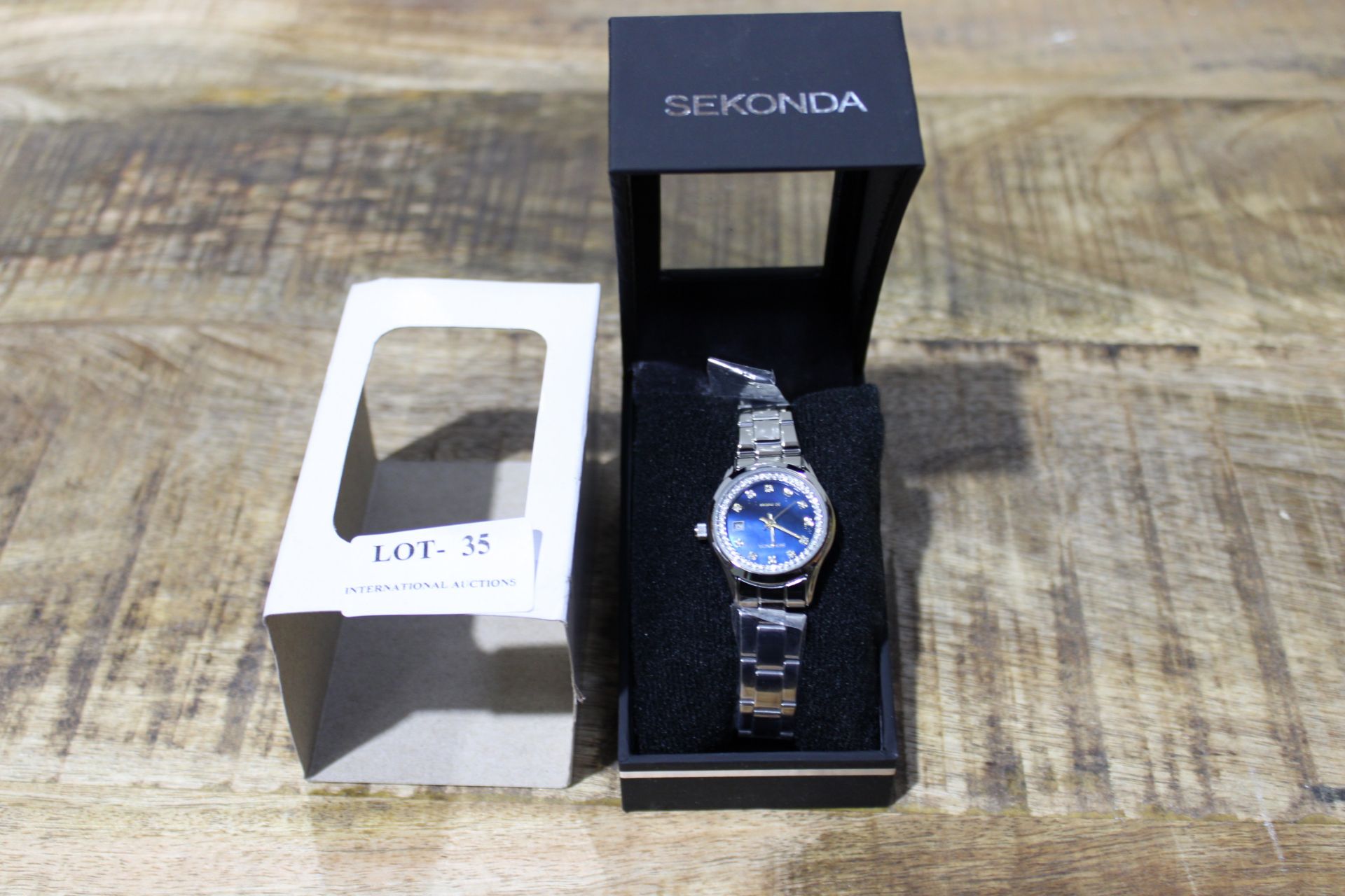 BRAND NEW SEKONDA WOMANS WATCH WITH BLUE FACE RRP £35 Condition ReportBRAND NEW