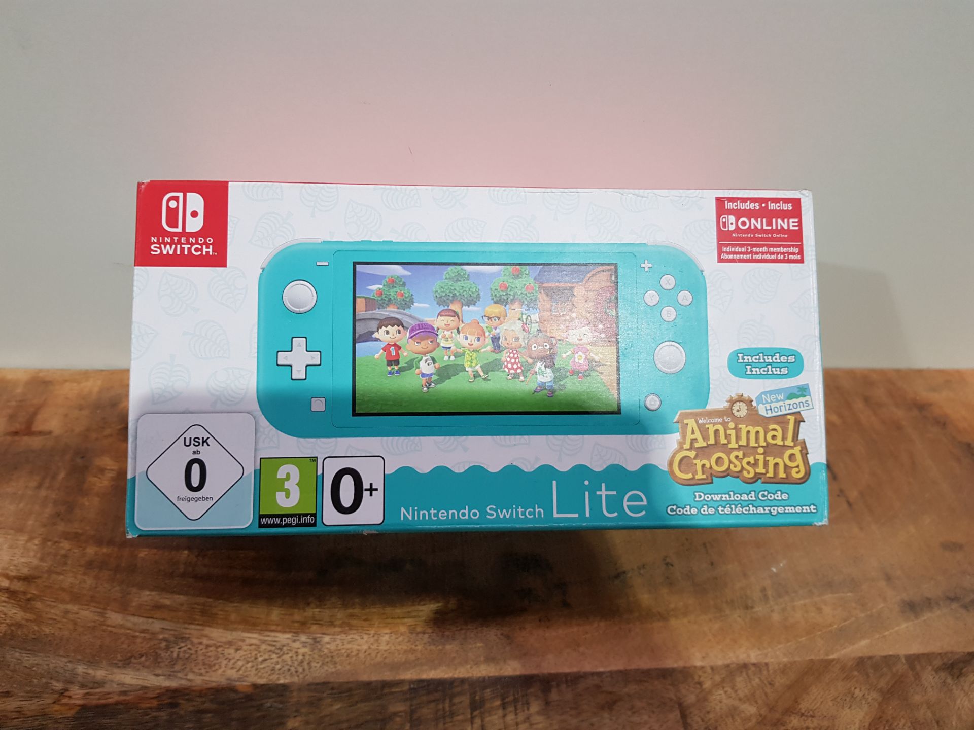 Nintendo Switch Lite (Turquoise) Animal Crossing New Horizons + NSO 3 months Â£219.95Condition