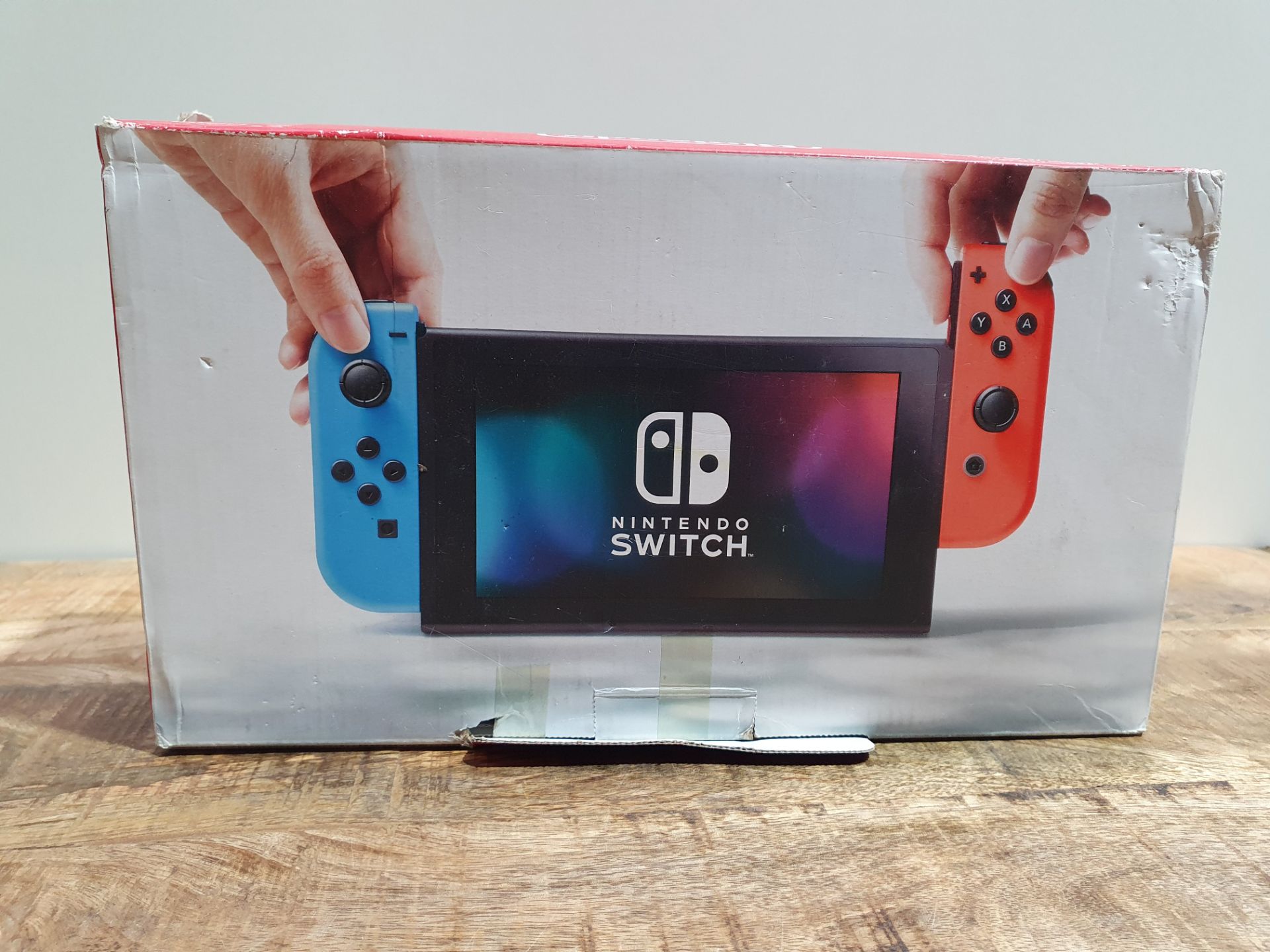 RRP £208.61 Nintendo Switch - Neon Red/Neon Blue