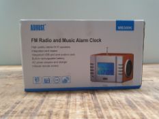AUGUST FM RADIO AND MUSIC ALARM CLOCK Condition ReportAppraisal Available on Request- All Items
