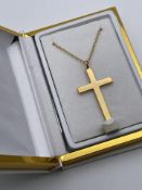 BOXED 9CT YELLOW GOLD CHAIN, SET WITH AN UNSTAMPED GOLD TONE CROSS, CHAIN- 28CM, RRP-£175.00
