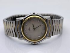 LADIES EBEL WATCH, 18CT YELLOW GOLD AND STAINLESS STEEL WITH MOTHER OF PEARL FACTORY DIAMOND DOT