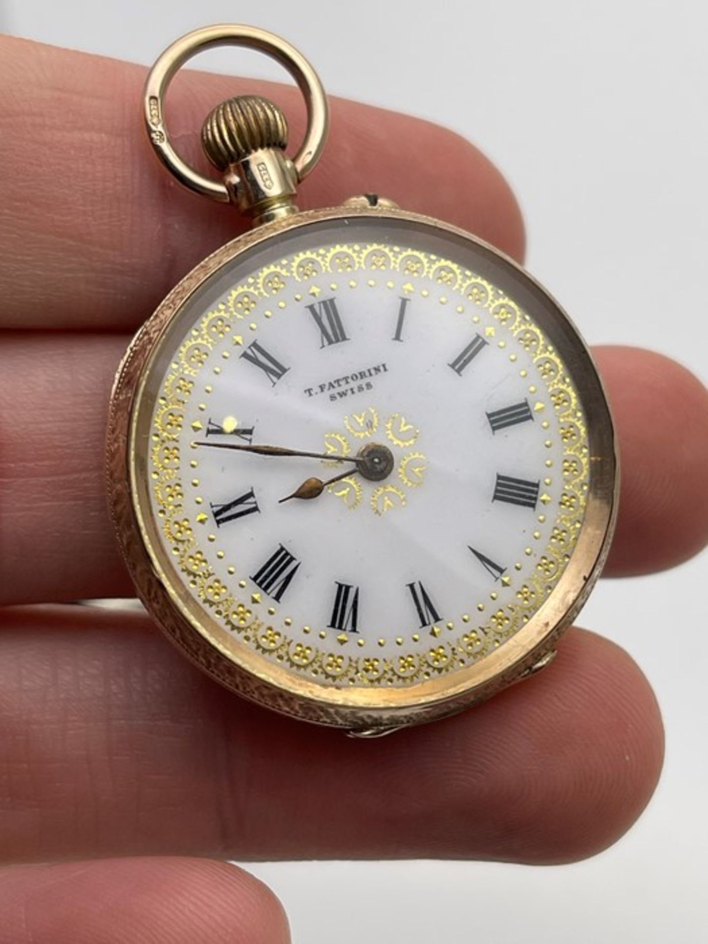 9CT YELLOW GOLD LADIES POCKET WATCH, MADE BY T.FATTORINI SWISS, DOES NOT APPEAR TO BE WORKING (