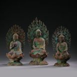 THREE SEATED BRONZE BUDDHAS, LIAO OR JIN DYNASTIES, CHINA