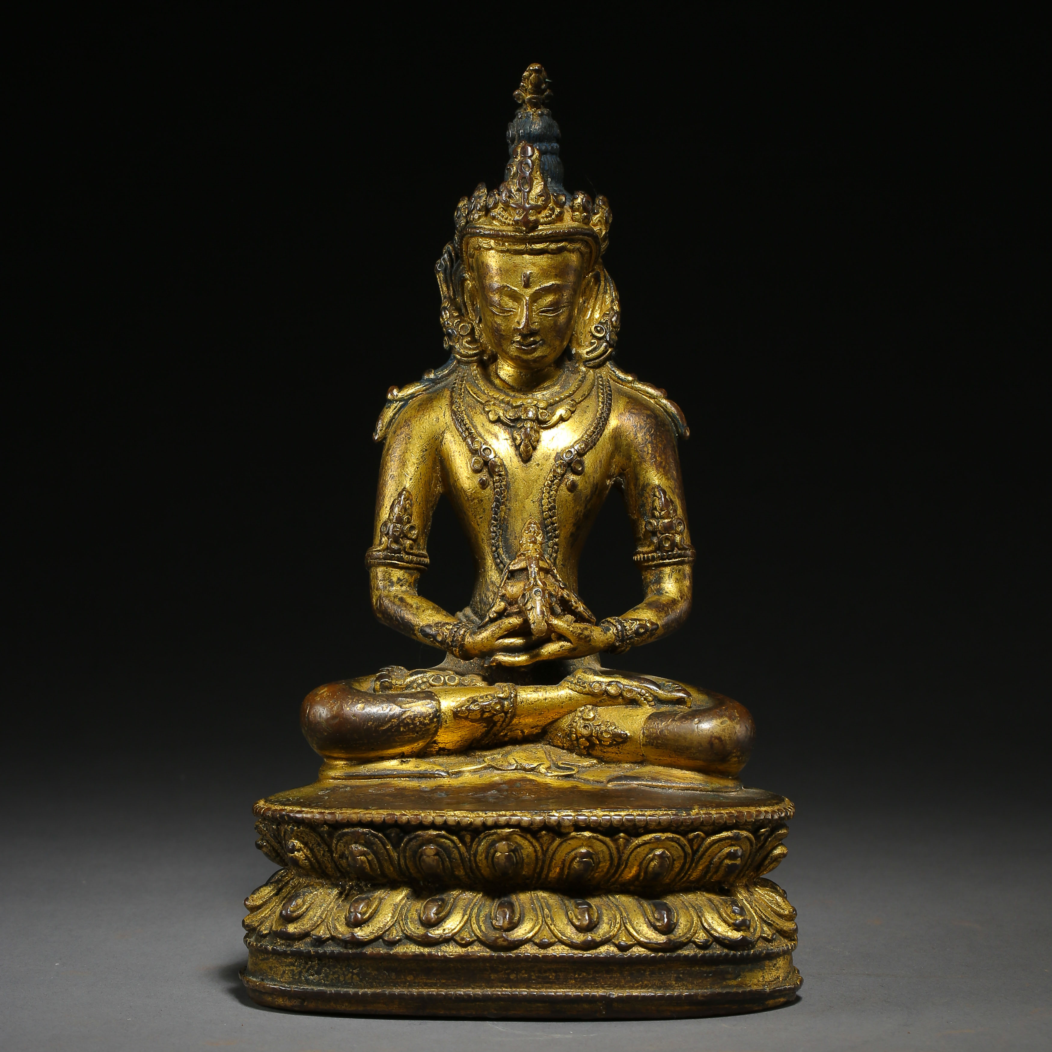 SEATED GILT BRONZE BUDDHA, QING DYNASTY, CHINA