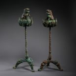 A PAIR OF BRONZE LION STATUES, INCENSE BURNERS FOR OFFERING FROM LIAO OR JIN DYNASTIES