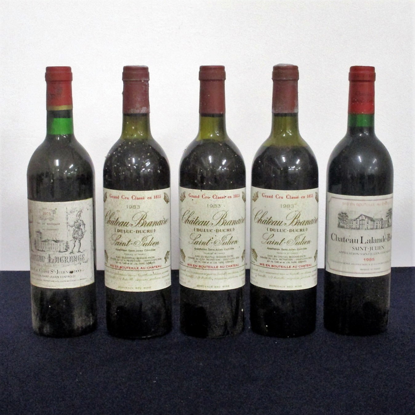 1 bt Ch. Lagrange 1975 St-Julien Grand Cru Classé 1975 vts, bs 3 bts Ch. Branaire Duluc-Ducru 1983