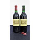 2 bts Ch. Lafite-Rothschild 1987 Pauillac, 1er Cru Classé i.n, vsl dstl, sl tear/scuffs to edge of