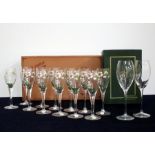 12 Perrier Jouêt Belle Epoque Champagne Flutes and 2 cased Bollinger Champagne Flutes, Riedel