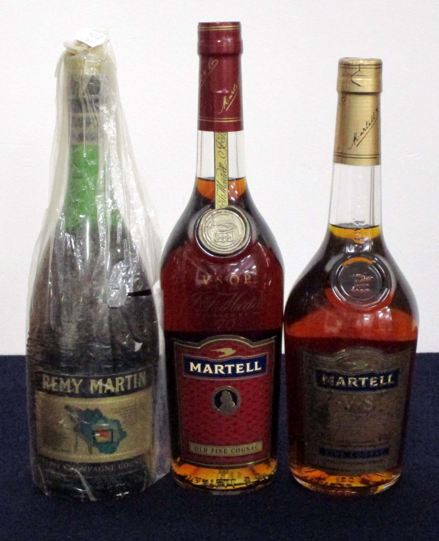 1 24 fl oz Rémy Martin Fine Champagne V.S.O.P. Cognac 70° proof 1 70-cl bt Martell V.S.O.P.