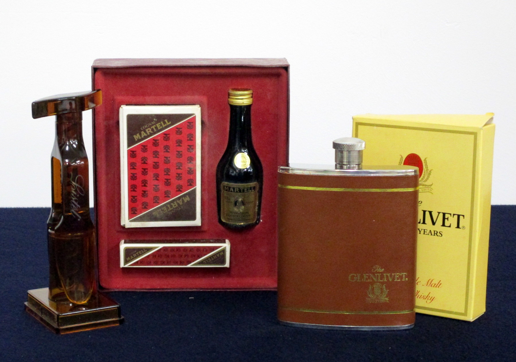 A Glenlivet Hip Flask A Screwpull Corkscrew A Martell VSOP miniature Cards and Dice Set