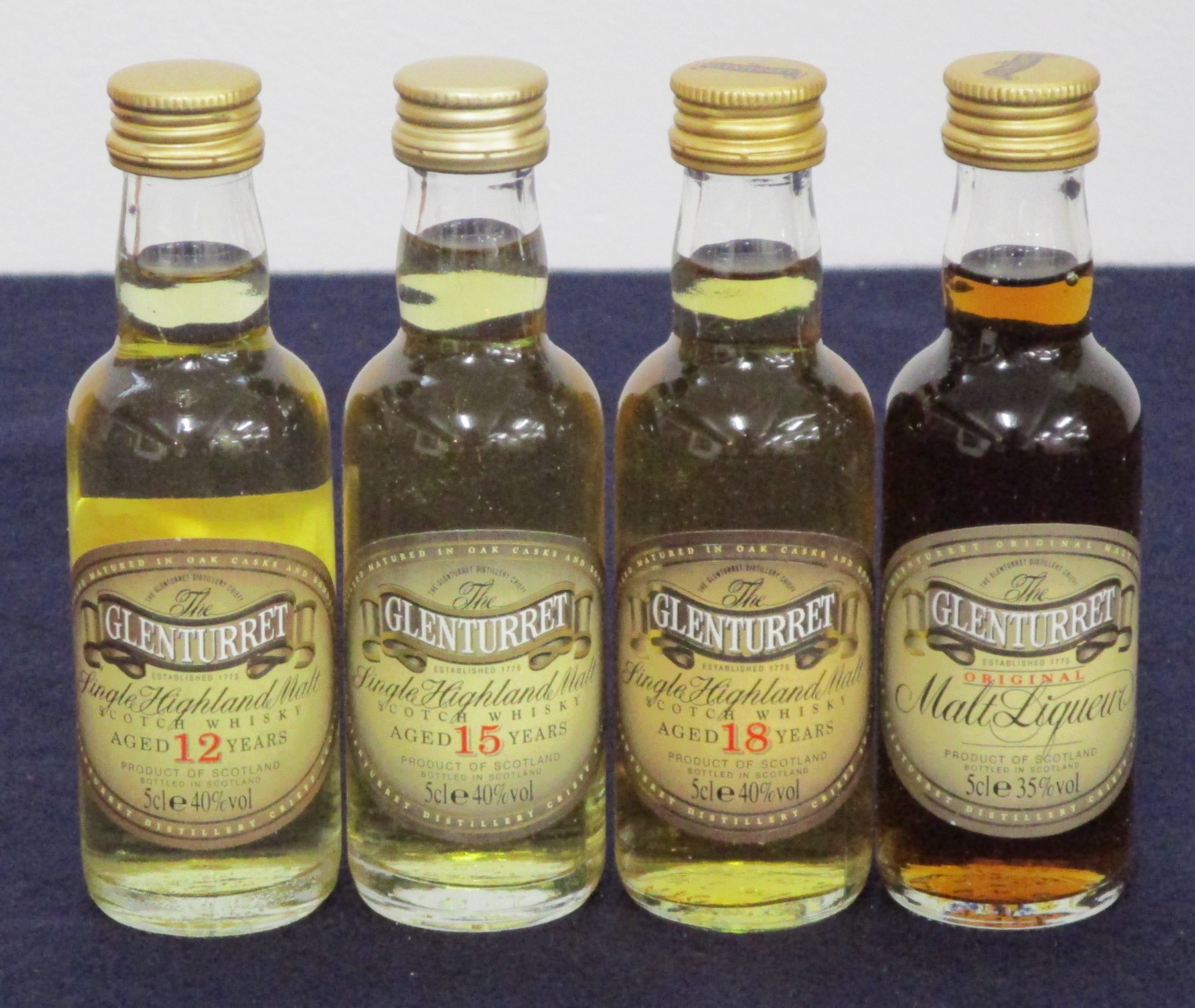 4 x 5cl bts The Glenturret Miniatures :- 1 x 12 YO, 1 x 15 YO, 1 x 18 YO and 1 Malt Liqueur