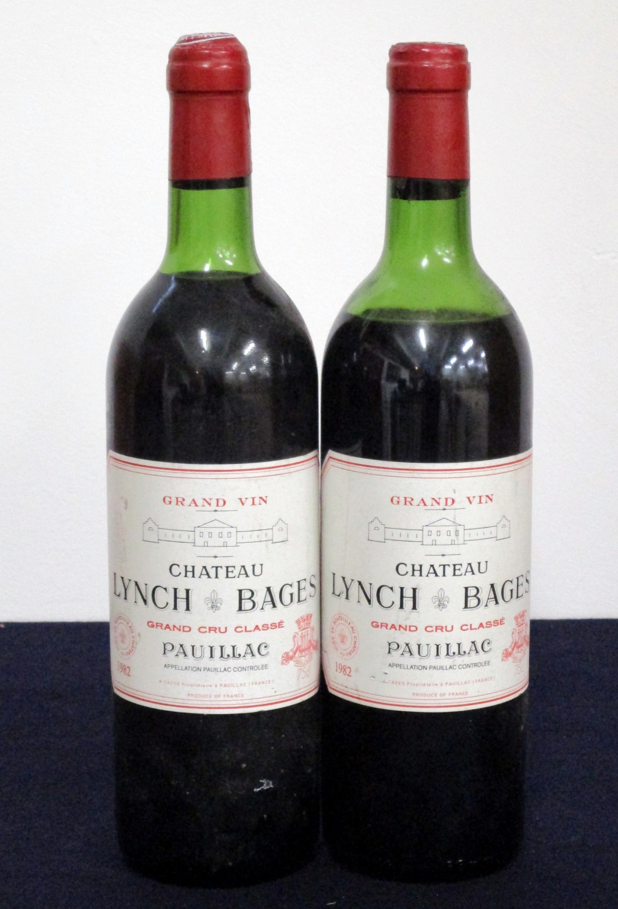 2 bts Ch. Lynch Bages 1982 Pauillac, 5me Cru Classé us, lms, 1 cork sl raised, sl split to capsule