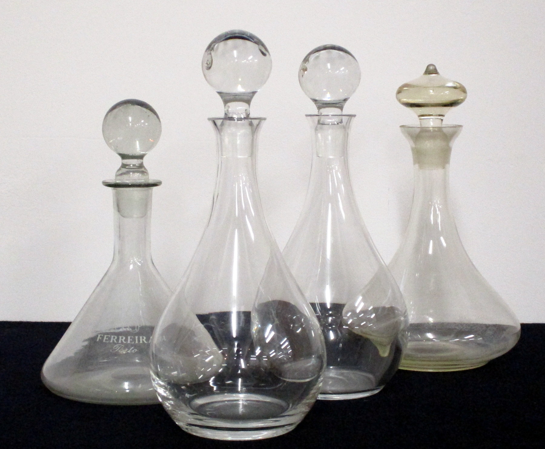 4 Assorted Decanters with Stoppers