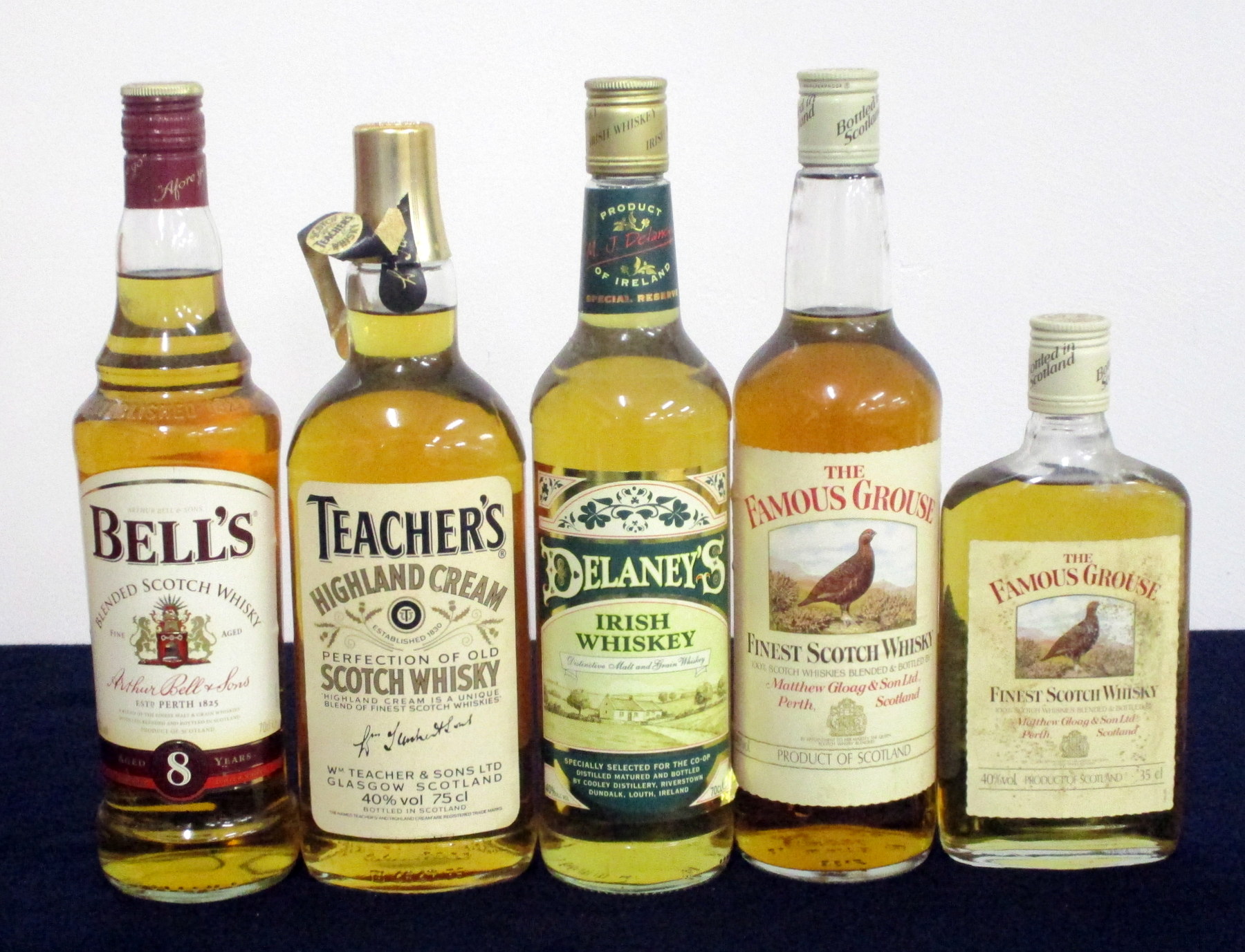 1 70-cl bt Bells 8YO Blended Scotch Whisky 1 75-cl bt Teachers Highland Cream Scotch Whisky 1 70-