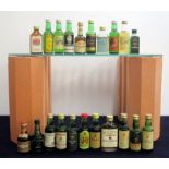 A selection of 21 miniature Scotch Whiskies incl:- Vat 69 and Stuart Royal