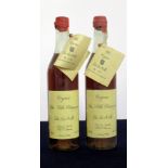 2 70-cl bts De La Motte Fine Petite Champagne Cognac 1914 bottle numbers 00137 and 00151, chipped