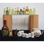 A Selection of 15 miniatures including Bells, Courvoisier Royal Commemorative Water Jug and Whisky