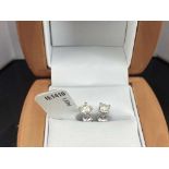 Pair of New 1.07 Carat Round Cut VS1/E Diamond Stud Earrings On 14K Hallmarked White Gold