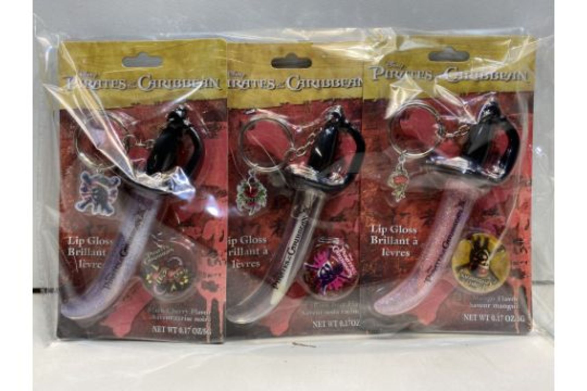 12 x Disney Pirates Of The Caribbean Lip Gloss Sword Key Chains | 719565245213