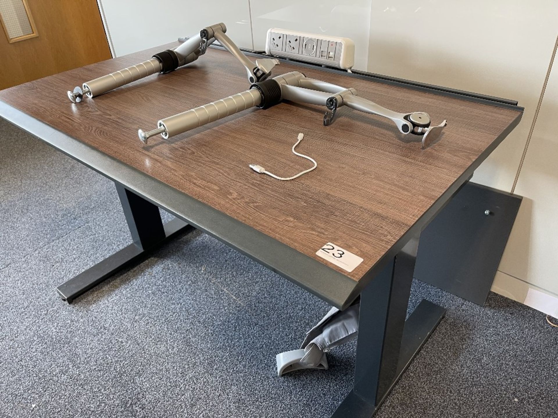 Vehyl gas spring operated sit to stand desk with dual monitor arms, comms & power module