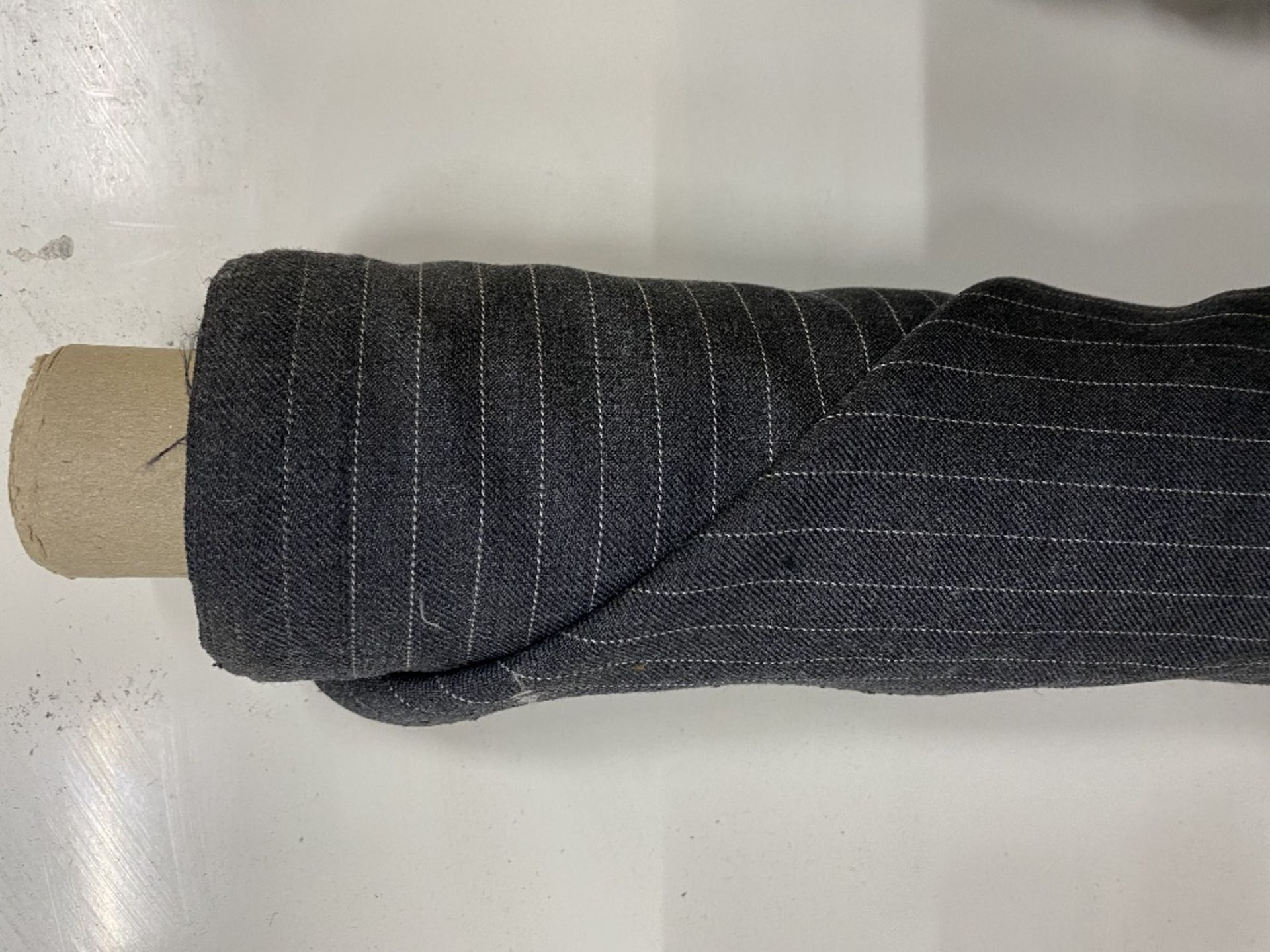 Black And Navy Rolls Of Used Striped Fabric - Image 2 of 3