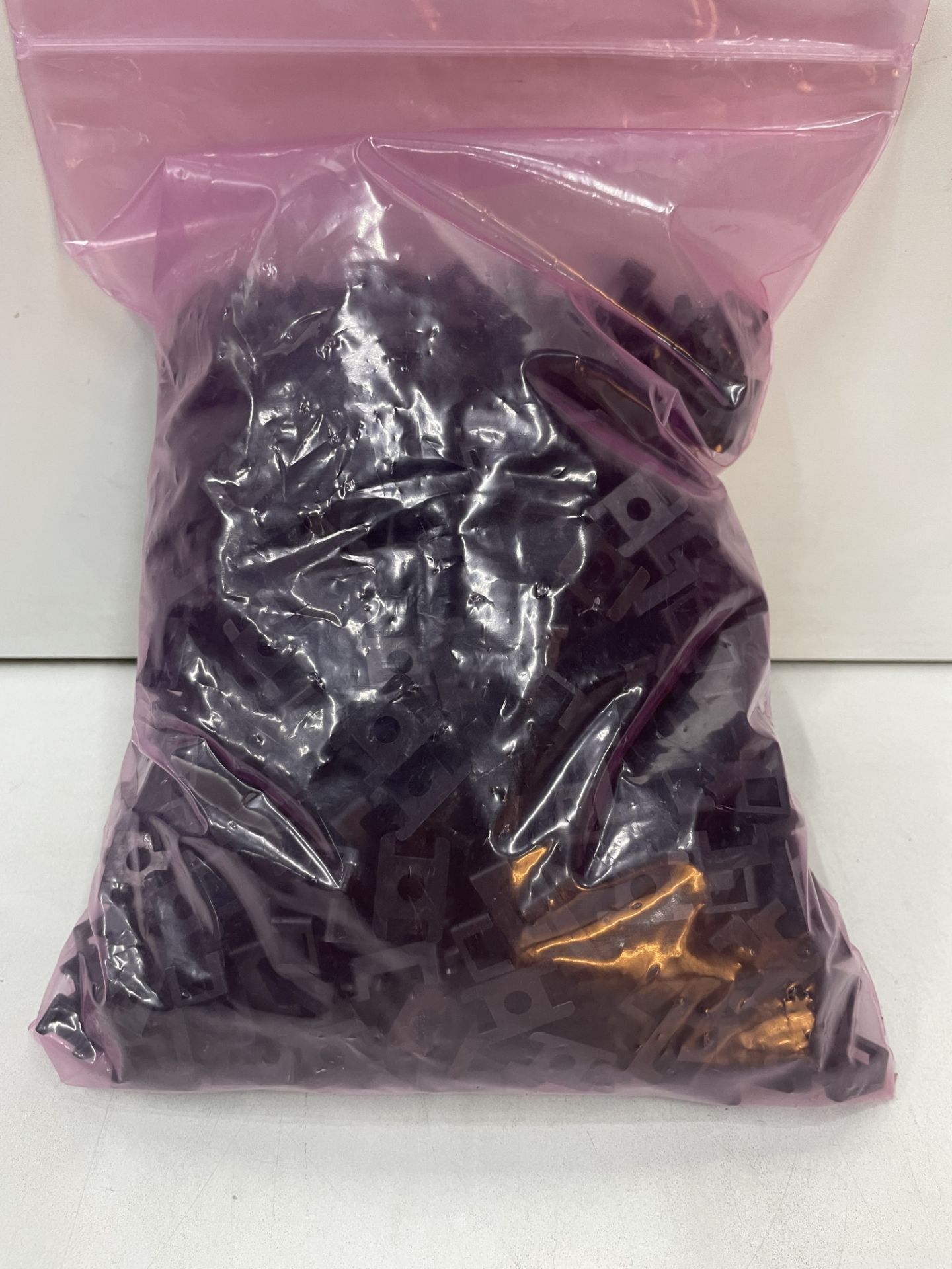 Approximately 700 x Black Plastic Clips