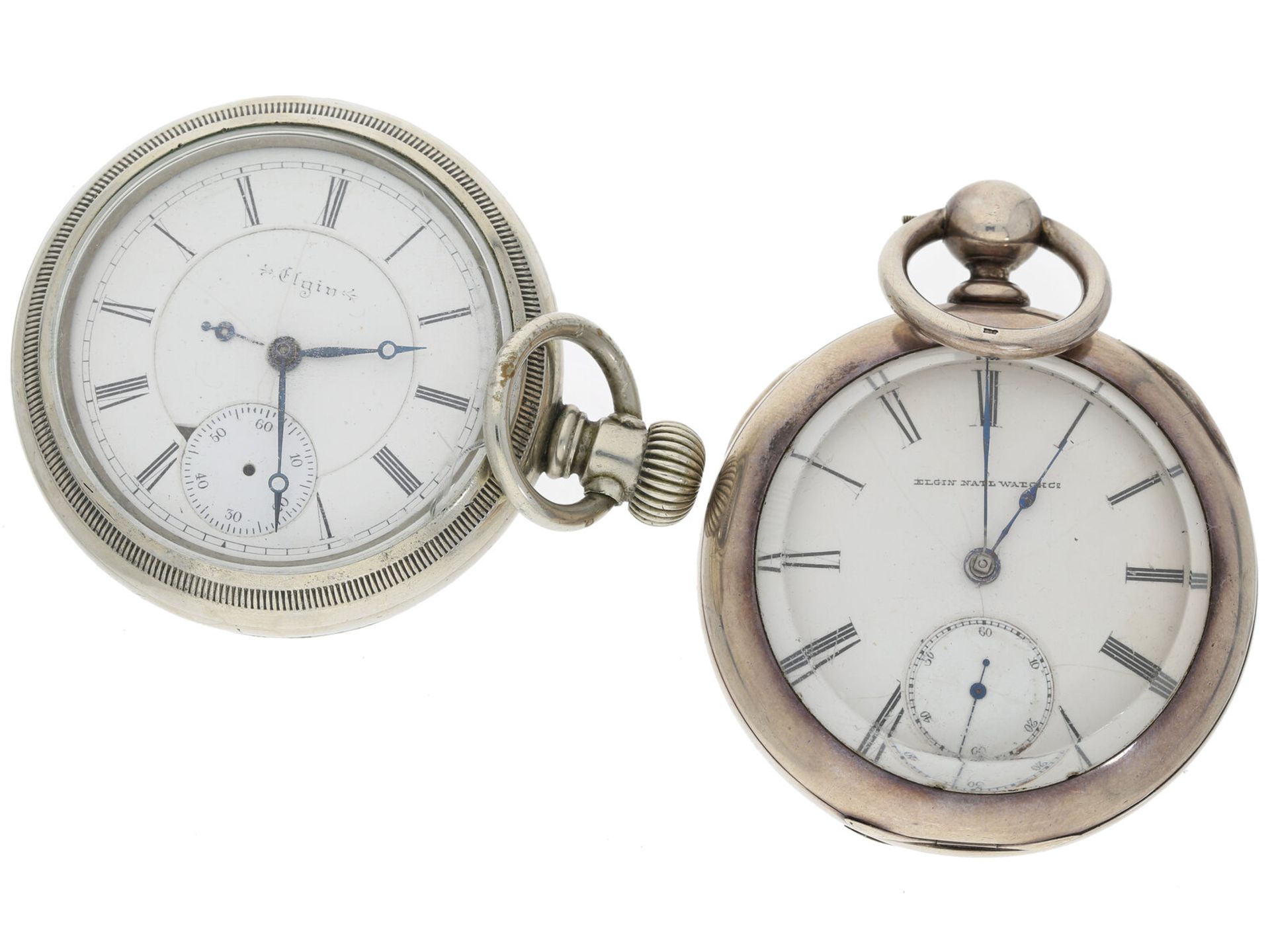 Taschenuhr: 2 schwere amerikanische Taschenuhren von Elgin, dabei eine seltene Eisenbahneruhr, um 19