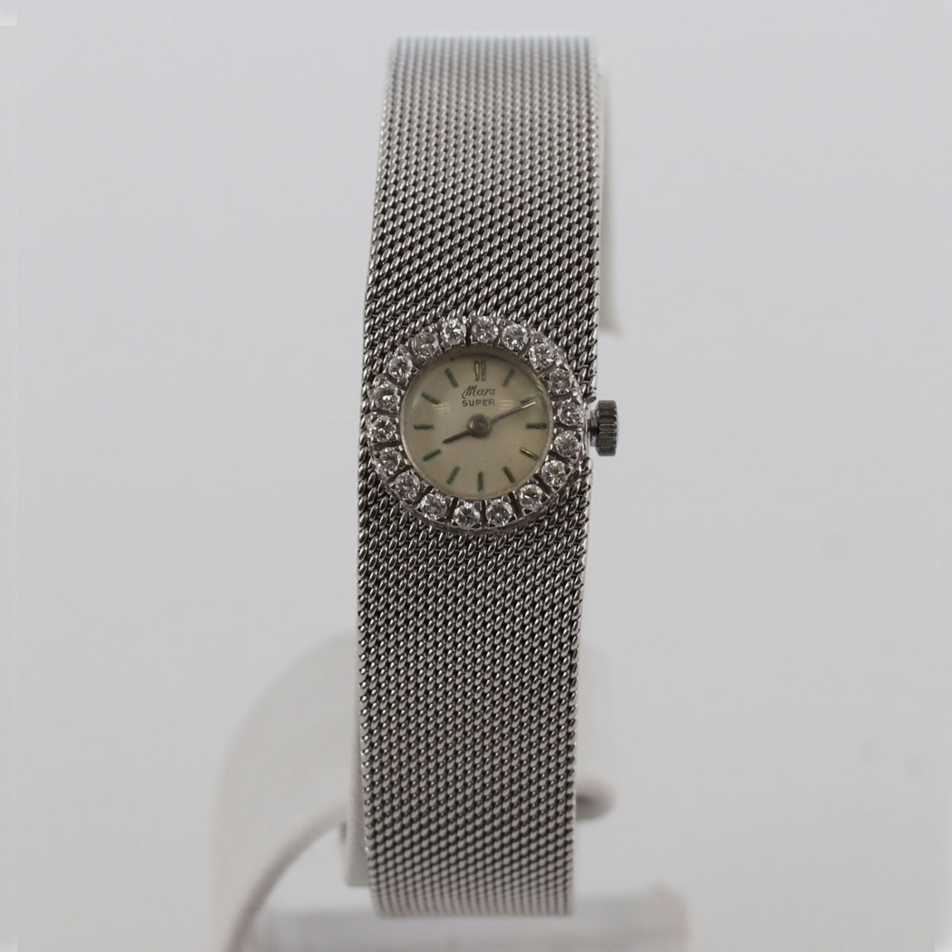 Weißgold-Armbanduhr mit Brillanten585/- Weißgold, gestempelt. Gewicht: 43,9 g. 18 Brillante