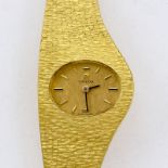 Asymmetrische Omega-Damenarmbanduhr Fa. Omega Watch & Co., Schweiz. 1980er Jahre. 750/- Gelbg