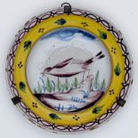 Großer Teller mit Vogelmotiv Kellinghusen, um 1800. Fayence. Heller Scherben mit hellgrauer